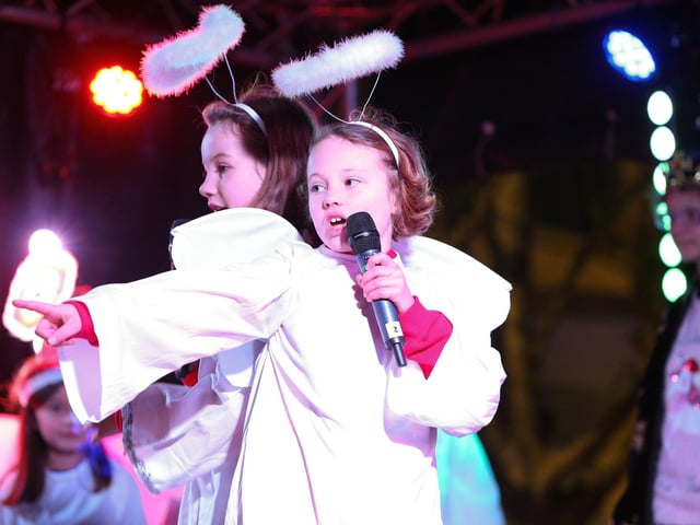 SD Studios Choir performing at the Christmas lights switch on in Palmerston Road, Southsea. Picture: Chris Moorhouse (251121-49).