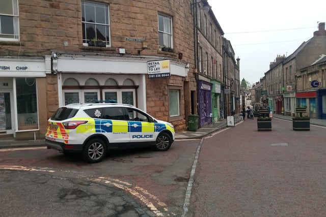 Police keep a watchful eye in Alnwick as businesses return to work.