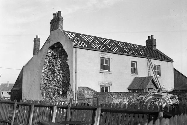 An undated view of a farmhouse being demolished in Horden - and the only clue is the notice on the dairy cart which reads  'Bainbridges Dairy Horden'. Can anyone tell us more?