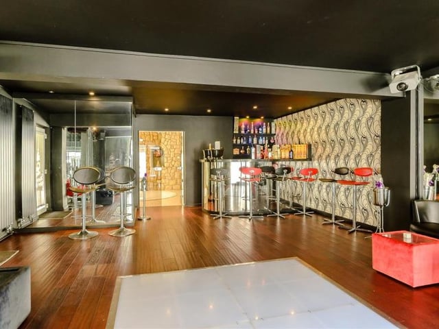 Who needs to go to the pub when you have your own bar area at home? Bright and spacious, it is fully fitted, with an LED dance-floor, a music and lighting system and French doors leading out to the garden. Perfect for parties with family and friends.