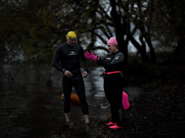 Open water swimming enthusiasts enjoy an early morning swim in Loch Lomond,Trossachs, Scotland. A new study from the UK Dementia Research Institute found that the blood of regular winter swimmers contains a "cold-shock" protein that wasn't found in that of people who did other cold-weather exercise on dry land. This protein has elsewhere been shown to slow the onset of dementia and even repair damage it causes in mice.