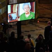 The Queen makes a video message to attendees of an evening reception to mark the opening day of the COP26 U.N. Climate Summit, in Glasgow