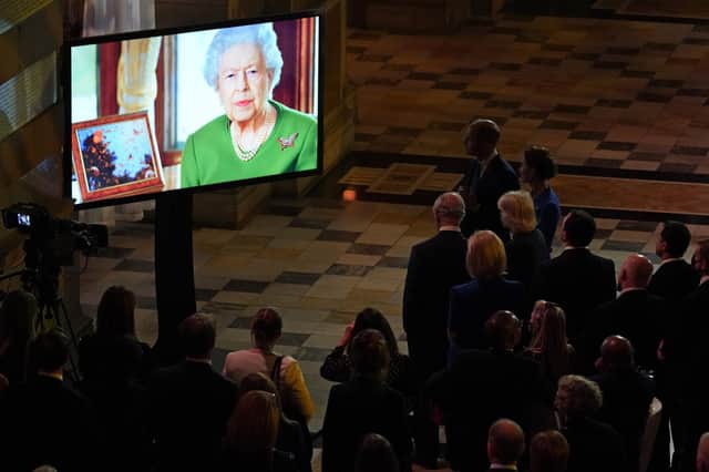 The Queen makes a video message to attendees of an evening reception to mark the opening day of the COP26 U.N. Climate Summit, in Glasgow