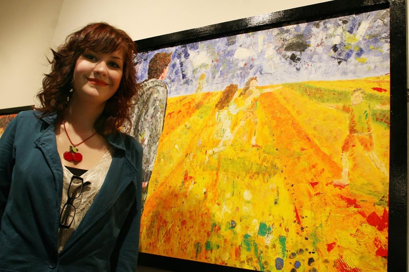 Buxton Community College student Beth de Cant with her painting entitled 'Catcher In The Rye' at the Artwork exhibition at Buxton Museum in 2009
