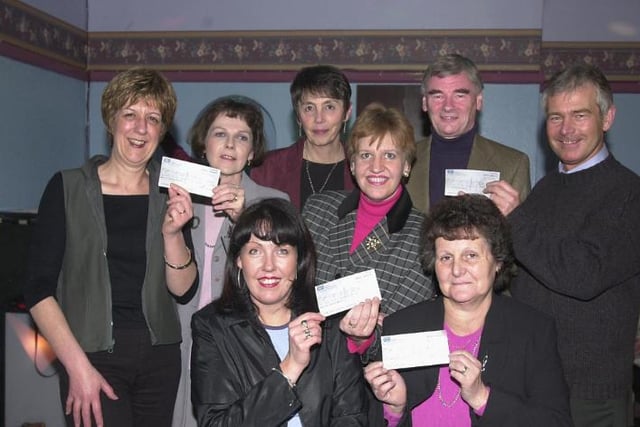 Library staff raise £4,000 for local charities in 2001.
