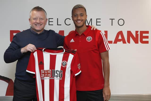 Chris Wilder, manager of Sheffield United, with Richairo Zivkovic: Simon Bellis/Sportimage