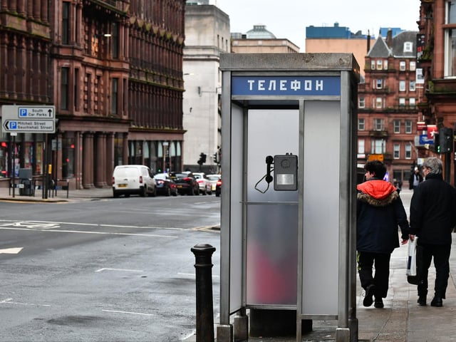 Local fixtures - like post boxes - are hidden behind prop phone boxes