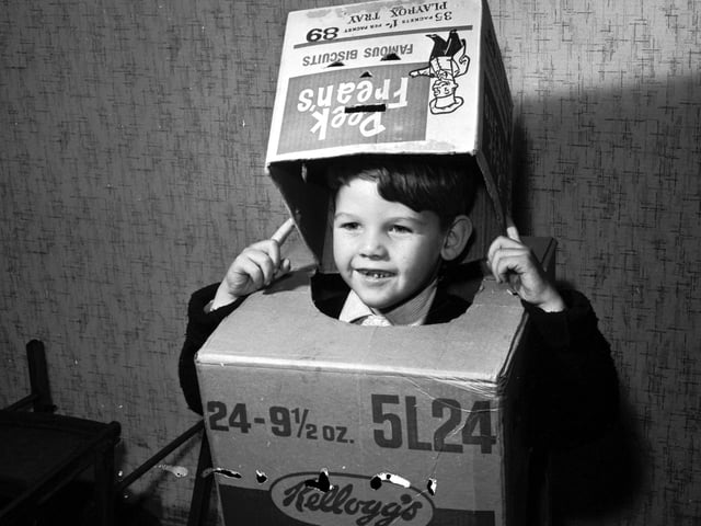 Michael Haughian from Clermiston in Edinburgh, dressing up in cardboard boxes as a robot to go guising.
