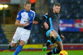 Ex-Sheffield Wednesday captain Tom Lees has signed for Huddersfield Town.