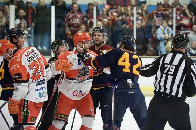 Sheffield Steelers' Robert Dowd gets stuck in against Guildford Flames