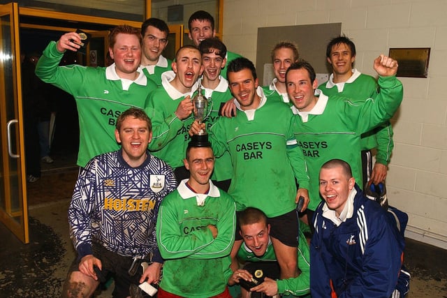 Caseys Bar celebrate victory in the Portsmouth Saturday League Cup final, 2004. PICTURE: Steve Reid