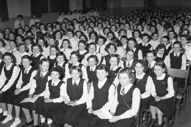 Who remembers gathering first thing in the morning for school assembly? And can anyone tell us which school is in the picture.