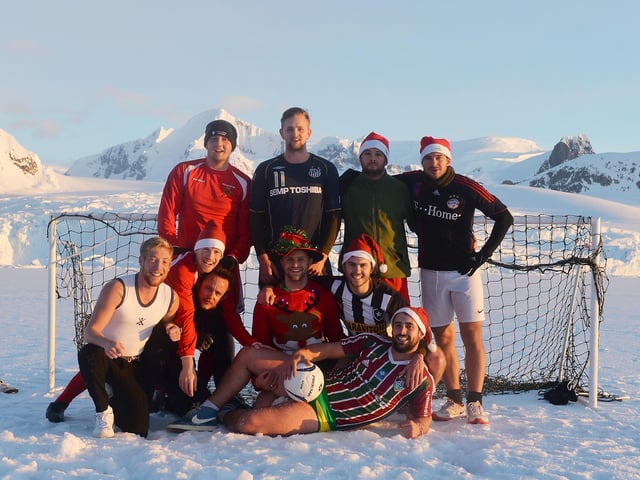 HMS Protector took advantage of the good weather and suitable ice conditions in 2013 to take their official Christmas photo. Back Row L-R: AB(SEA) Scott, AB(SEA) Smith, LET(WE) Wade, AB(ET) Voudouris. Front Row L-R: LPT Smith, CH Green, LS(HM) Lincoln, LET Harvey, AB(SEA) Daubney, AB(D) Coburn.