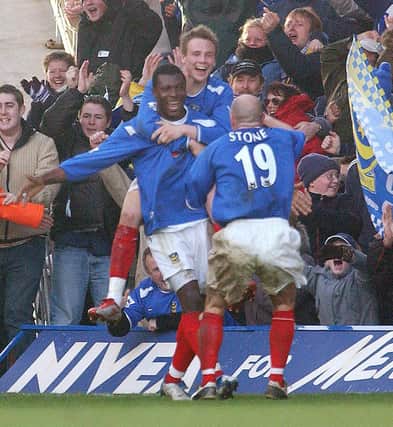 Yakubu celebrates scoring Pompey's opening goal in the 4-1 victory over Southampton in 2005. Picture: Neil Munns