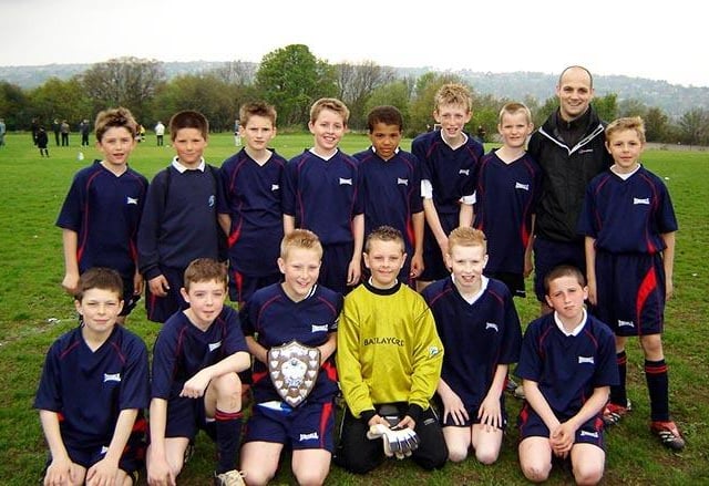 Chaucer School PE teacher Jon Rayment with Y7 footballers who have won Sheffield inter-school championships, on May 8, 2006