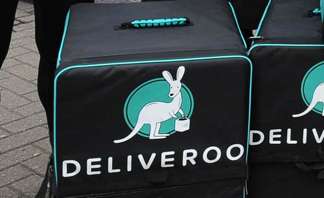 A Deliveroo logo, as the online food platform has boosted its partnership with Majestic Wine by rolling out 30-minute wine, spirits and champagne deliveries to 80 sites across the country. Photo: Rui Vieira/PA Wire