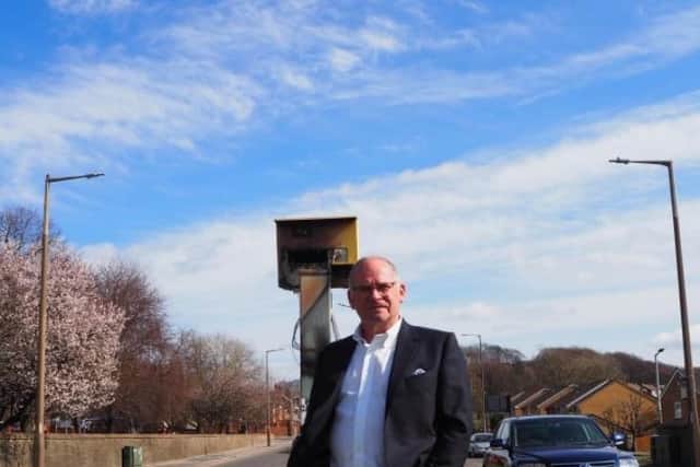 Councillor Wayne Johnson with the speed camera on Ardsley Hill, taken by Danielle Andrews.