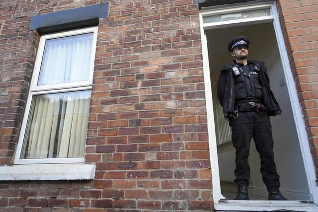PC Stanistreet at the 'cop house' on Robey Road. Picture Scott Merrylees
