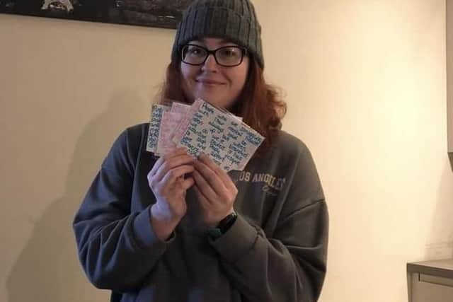 Kayleigh pictured with some of the notes she writes by hand, before sharing them around Rotherham.