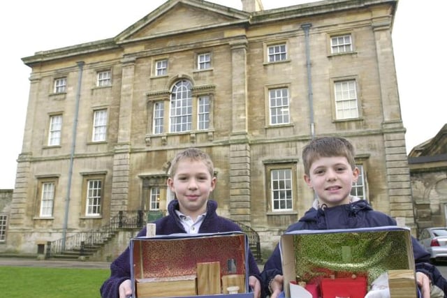 In 2001 children were invited to the hall to make miniature dollhouse rooms. Ben Groves and Daniel Atkinson are pictured here with their creations.