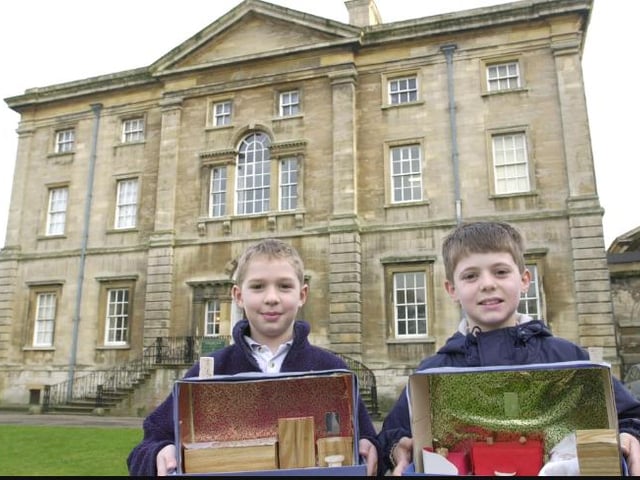In 2001 children were invited to the hall to make miniature dollhouse rooms. Ben Groves and Daniel Atkinson are pictured here with their creations.
