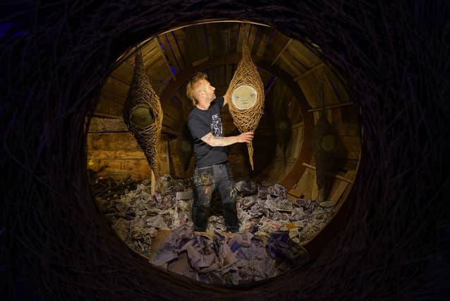 Artist My Dog Sighs, makes finishing touches to his 'Inside' exhibition. Picture: Andrew Matthews/PA Wire