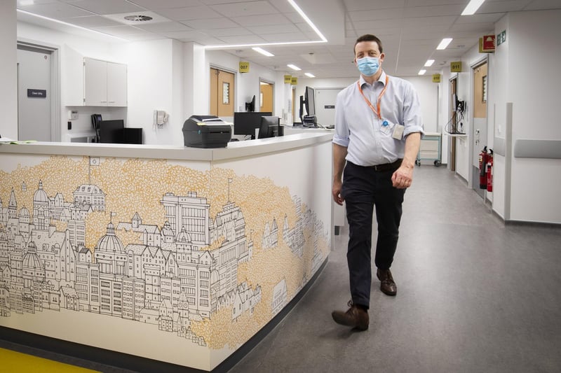 Consultant Dr Paul Leonard walks through the new reception area in the Emergency Department.