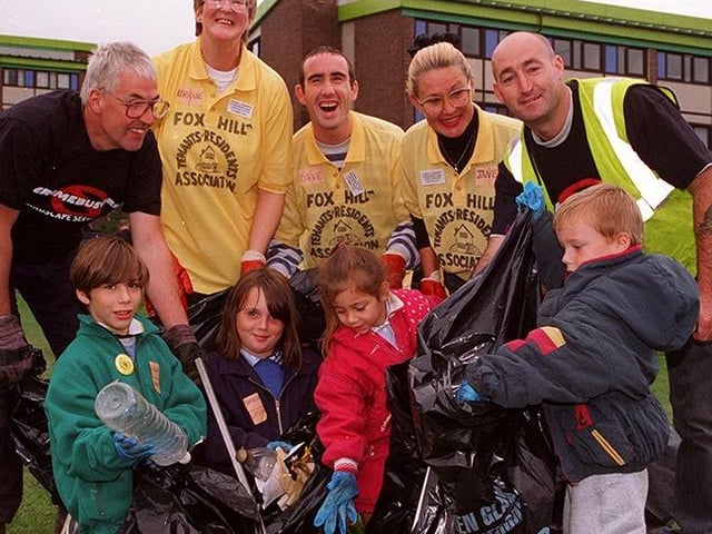 Local schoolchildren, tenants and grimebusters help to clear up the Foxhill Estate on September 5, 1996. Pictured are Alan Commander, Lorraine Cutts, David Knight, Janet Gregory and Shaun Grafton, with Jason Fearnley, Samantha Walton, Lauren Fearnley and Nicky Crossley from the Foxhill Primary School