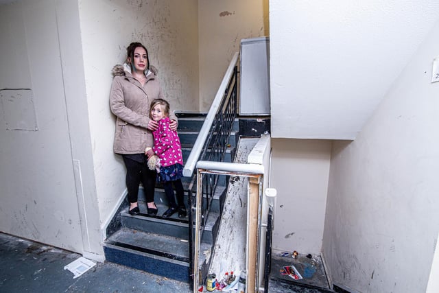 Leah Hardwick with her daughter, Ayra 5, inside Windsor House which is in a dire state. Picture: Habibur Rahman