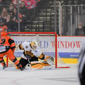 Brendan Connolly scores the winner for Sheffield Steelers against Nottingham Panthers. Pic: Dean Woolley