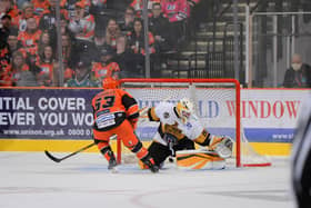 Brendan Connolly scores the winner for Sheffield Steelers against Nottingham Panthers. Pic: Dean Woolley