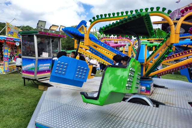 There are plenty of rides for kids including this mini hang glider based ride costing £2.