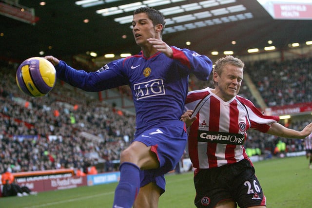 Derek Geary fights for possession with Manchester United's Cristiano Ronaldo at Bramall Lane in November 2006.