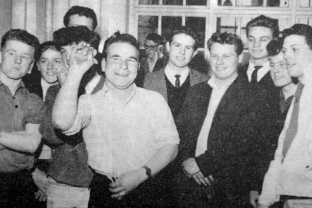 Edwin Healey takes aim during a West Hartlepool Inter Youth Club darts tournament that was held at the Newburn Youth Club in 1963.