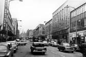 The Moor, Sheffield, showing Robert Brothers Department Store, Rockingham House, British Home Stores and Paulden's in February 1966