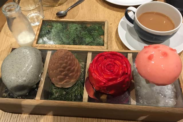 The delicious desserts as part of the winter themed afternoon tea at Cassinelli's; hazelnut pine cone, lemon and poppy seed pebble, strawberries and cream toadstool and raspberry and lime rose