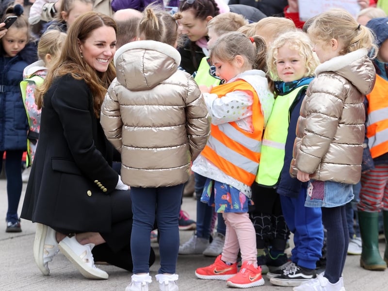 Countess of Strathearn speaks with young children as she visits local fishermen and their families to hear about the work of fishing communities with Prince William on day six of their week long visit to Scotland on May 26 in Fife, Scotland.