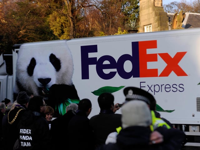 Tian Tian and Yang Guang were transported to Edinburgh Zoo in specially branded transportation