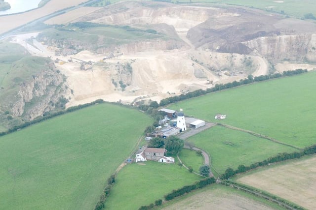 A dramatic aerial view from 2011 showing the early 19th century Hart windmill pictured opposite Hart Quarry.
