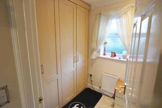 Not many bedrooms in Mansfield Woodhouse boast their own dressing room. But here is another reason why this property stands out. The room features fitted wardrobes and space for storage.
