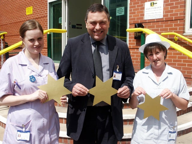 Sheffield Children's Hospital staff celebrate getting a three- star rating in 2004. Lorna Birchenall, Daycare Staff Nurse, with Chief Executive Chris Sharratt and Helen Staves from Catering