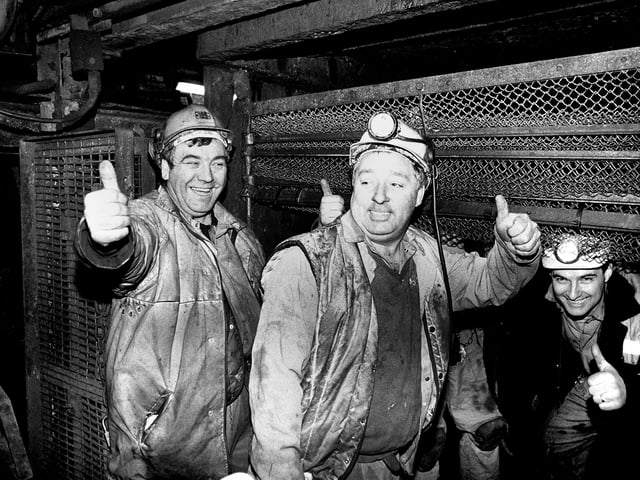 Happy miners returning to work in 1994