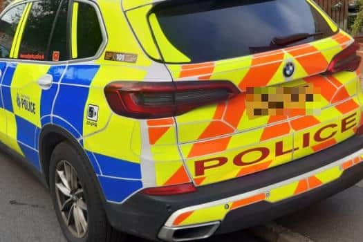 A man has appeared before a court after a row over parking got out of hand. File picture shows a police car attending an incident in Sheffield