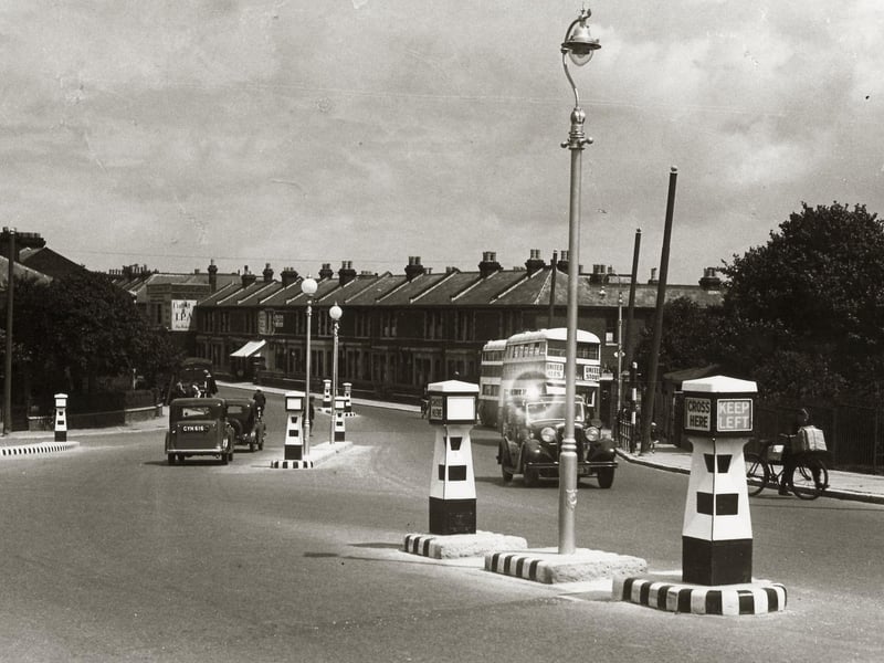 The Saxons settled on Portsea Island in the 6th century including one called Coppa who is believed to have owned a stretch of shoreline, in the Saxon language an ora. with the combination creating Coppan ora, with the ''n' added in place of an apostrophe. By the time the Domesday Book was published in 1086, it had changed to Copenore before being later known as Copnor. Nearby Baffins was farmland which included Baffins Pond, Baffins Farm, and Tangier Farm with those place names retained and reused for the names of the area and the roads. In the late 19th, and early 20th century the rapid expansion of Portsmouth saw the areas engulfed by the growing city. 
Pictured: Copnor Bridge in Copnor Road in July 1936.