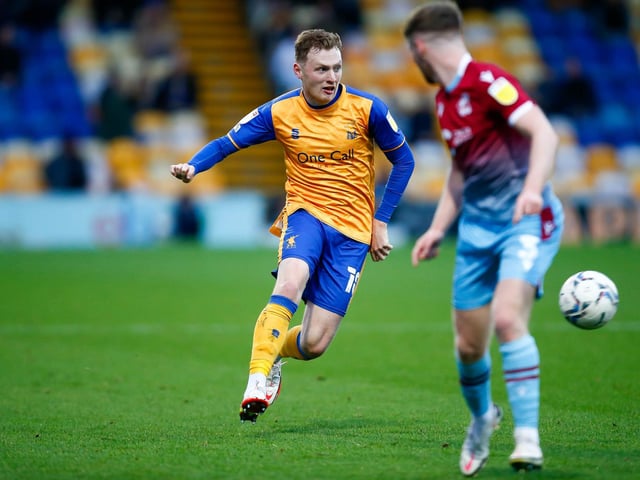 Mansfield Town midfielder George Maris picks a pass.