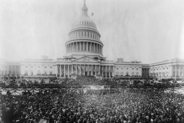 View of the large crowd gathered at the United States Capitol to witness President Woodrow Wilson's second inauguration, Washington DC, 1917.