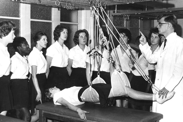 Mr Robertshaw lectures on sling supension for mobilising the spine at the new School of Physiotherapy, Gell Street, Sheffield, January 1962