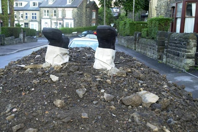A humorous addition to a skip full of soil on Osborne Road, Nether Edge, July 2002