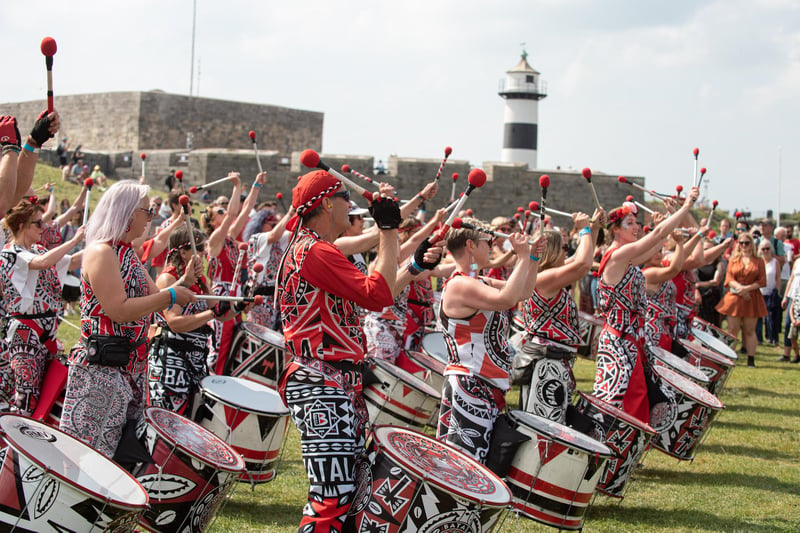 Batala Portsmouth drum band perform on the Castle Field. Picture: Vernon Nash (290821-201)