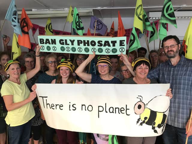 Extinction Rebellion supporters say no to Glyphosate. Picture taken before the pandemic